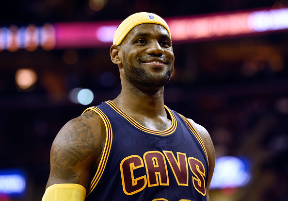 CLEVELAND, OH - OCTOBER 30: LeBron James #23 of the Cleveland Cavaliers smiles after a play in the second quarter against the New York Knicks at Quicken Loans Arena on October 30, 2014 in Cleveland, Ohio. NOTE TO USER: User expressly acknowledges and agrees that, by downloading and or using this photograph, User is consenting to the terms and conditions of the Getty Images License Agreement.  (Photo by Jason Miller/Getty Images)