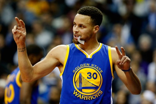 WASHINGTON, DC - FEBRUARY 03: Stephen Curry #30 of the Golden State Warriors reacts after scoring against the Washington Wizards in the first half at Verizon Center on February 3, 2016 in Washington, DC. NOTE TO USER: User expressly acknowledges and agrees that, by downloading and or using this photograph, User is consenting to the terms and conditions of the Getty Images License Agreement. (Photo by Rob Carr/Getty Images)