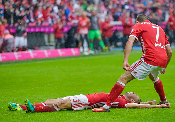 Bayern Munich's Brazilian defender Rafinha (Bottom) celebrates his goal with Bayern Munich's French midfielder Franck Ribery (R) during the German first division Bundesliga football match of Bayern Munich vs FC Ingolstadt in Munich, southern Germany, on September 17, 2016. / AFP / GUENTER SCHIFFMANN / RESTRICTIONS: DURING MATCH TIME: DFL RULES TO LIMIT THE ONLINE USAGE TO 15 PICTURES PER MATCH AND FORBID IMAGE SEQUENCES TO SIMULATE VIDEO. == RESTRICTED TO EDITORIAL USE == FOR FURTHER QUERIES PLEASE CONTACT DFL DIRECTLY AT + 49 69 650050 (Photo credit should read GUENTER SCHIFFMANN/AFP/Getty Images)