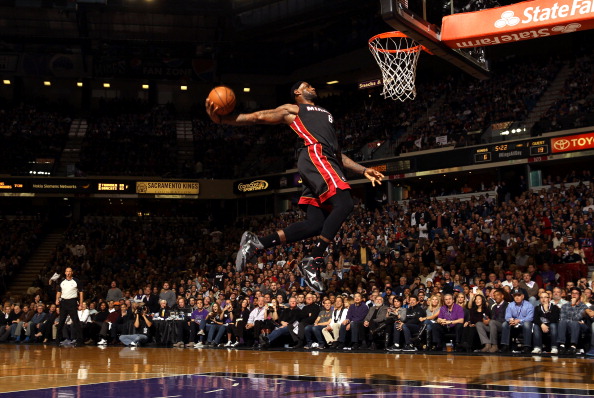 SACRAMENTO, CA - DECEMBER 27: LeBron James #6 of the Miami Heat dunks the ball during their game against the Sacramento Kings at Sleep Train Arena on December 27, 2013 in Sacramento, California. NOTE TO USER: User expressly acknowledges and agrees that, by downloading and or using this photograph, User is consenting to the terms and conditions of the Getty Images License Agreement. (Photo by Ezra Shaw/Getty Images)